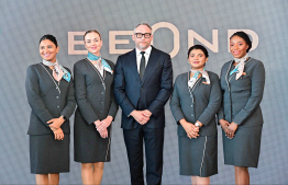 Beond's Chairman and CEO Tero Taskila with some of the airline's air hostesses -- Photo: Fayaz Moosa | Mihaaru