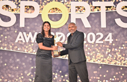 Best badminton player award being handed over to Fathimath Nabaha (Naba) at the Maldives Sports Awards -- Photo: Fayaz Moosa | Mihaaru