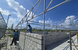 Council employees working on the cat facility -- Photo: Male' City Council