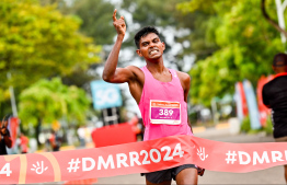 Riza celebrating after winning his race at the Dhiraagu Maldives Road Race -- Photo: Nishan Ali | Mihaaru