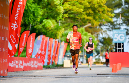 Local record holder of multiple running events, Hussain Fazeel running in the Dhiraagu Maldives Road Race 2024's half marathon -- Photo: Nishan Ali | MIhaaru