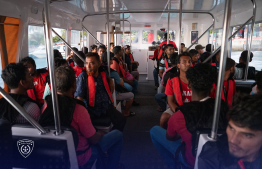 Detained expatriates being transported back to Male' - Photo: Immigration