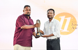 Mihaaru News Journalist Mohamed Hamdhoon being conferred the Journalism Award in the field of History and Culture -- Photo: Fayaz Moosa