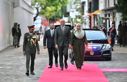 President Muizzu and First Lady Sajidha attend flag hoisting ceremony and guard mount at the Victory Day monument.-- Photo: President's Office