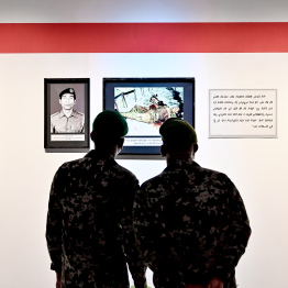 MNDF officers view some of the exhibits displayed at MNDF's dedicated exhibition opened to commemorate Victory Day -- Photo: Nishan Ali