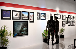 MNDF officers view some of the exhibits displayed at MNDF's dedicated exhibition opened to commemorate Victory Day -- Photo: Nishan Ali