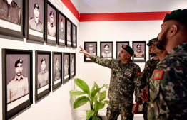 MNDF officers view some of the exhibits displayed at MNDF's dedicated exhibition opened to commemorate Victory Day -- Photo: Nishan Ali