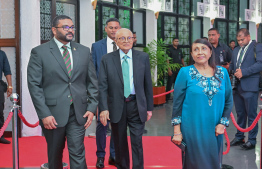 Fomer President Maumoon Abdul Gayoom (C), then First Lady Nasreena Ibrahim and their son, current Defence Minister Mohamed Ghassan Maumoon at last night's Victory Day ceremony.-- Photo: President's Office