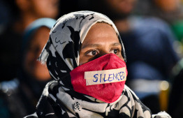 An attendee at last night's MDP Rally.-- Photo: Nishan Ali / Mihaaru