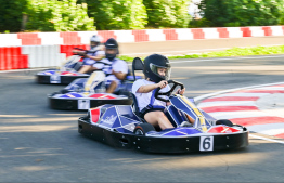 Kandima Maldives staff driving the e-go-karts, the first of its kind in Maldives, during the track inauguration day -- Photo: Fayaz Moosa | Mihaaru