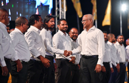 Former President Ibrahim Mohamed Solih greeting the party's members ahead of "In Defence of the Constitution" event held by the party at Malé Carnival area -- Photo: Nishan Ali | Mihaaru