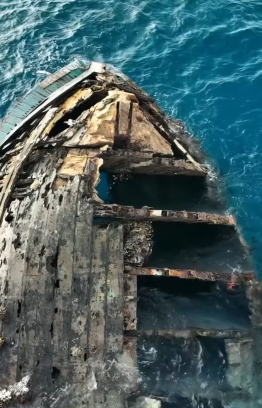 Vaavu atolls famous shipwreck flipped upside down -- Photo: Hevana Maldives