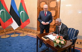 President Dr Mohamed Muizzu signs the Visitor's Book after his welcome reception.-- Photo: President's Office