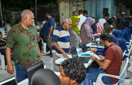 Fish can cases being distributed in the Malé area ahead of Ramadan -- Photo: Nishan Ali | Mihaaru