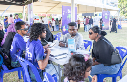 Information about MIB's services being shared with visitors at the MIB Bingaa maahefun -- Photo: MIB