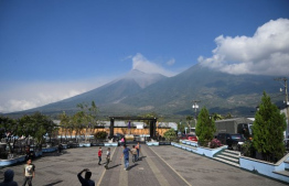 Fuego volcano erupts as seen from Alotenango, Sacatepequez department, some 65 kilometres southwest Guatemala City on March 10, 2025. Guatemalan authorities evacuated around a thousand people on Monday after Central America's most active volcano erupted, spewing lava, ash and rocks. (Photo by JOHAN ORDONEZ / AFP)