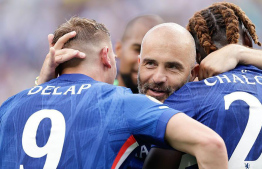 ކޯޗު މަރެސްކާ (މ)، ޗެލްީގެ ޑިލެޕް (ވ) އާއެކު.-- ފޮޓޯ: ގެޓީ އިމޭޖަސް