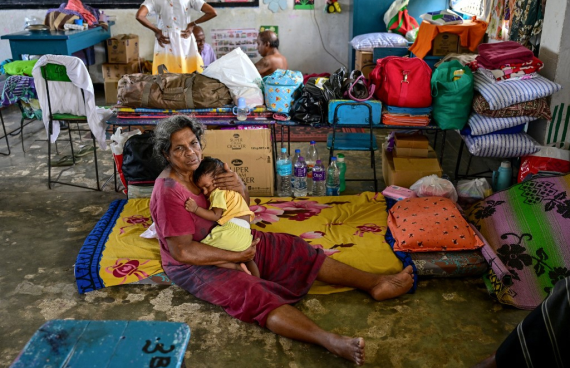 ލަންކާއަށް ކުރި ވިއްސާރާގައި އާއިލާއެއް ހާލުގައި ޖެހިފައި،-- ފޮޓޯ: އޭއެފްޕީ